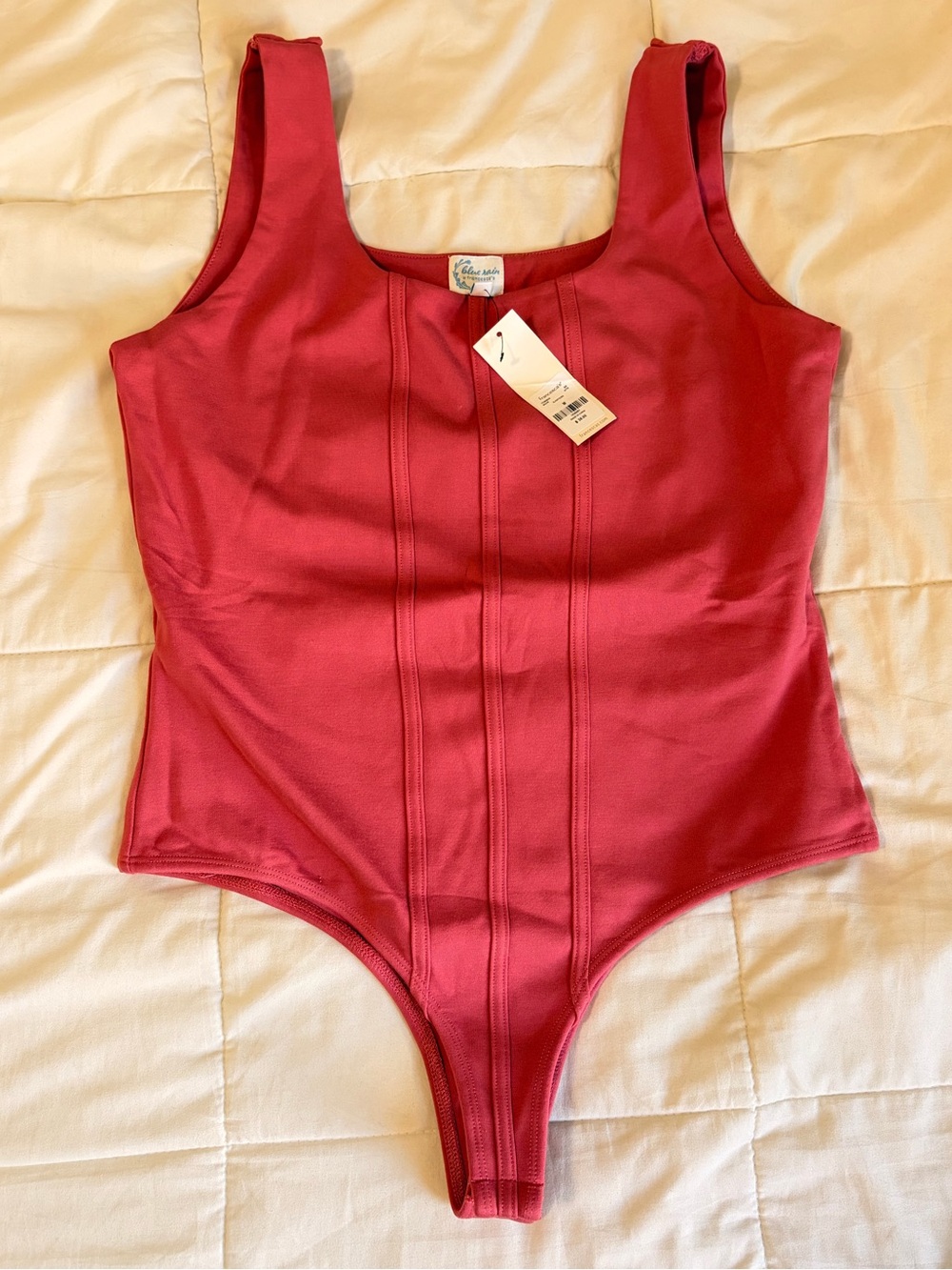 FRANCESCA’S PINK BODYSUIT